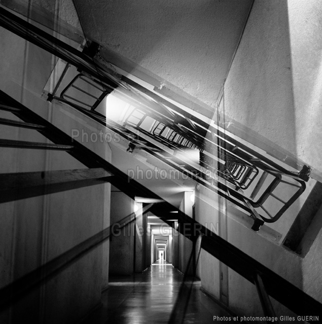 Perspectives... - ...Surimpression de la photo d'un couloir long et sombre et d'une cage d'ecalier en contre-plonge
